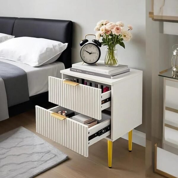 white-nightstand-with-clock-and-flowers