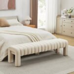 Elegant Noor Luxe Cream Bouclé Bench in bedroom setting
