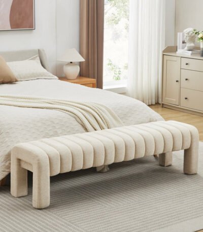 Elegant Noor Luxe Cream Bouclé Bench in bedroom setting