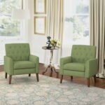 Set of 2 green armchairs in bedroom or lounge setting