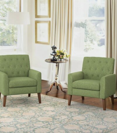 Set of 2 green armchairs in bedroom or lounge setting